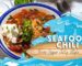 Bowl of seafood chili with shrimp jalapeno sour cream for the recipe