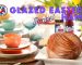 Easter set table with TPJ products blurred in the background and a spiral cut ham on a white platter